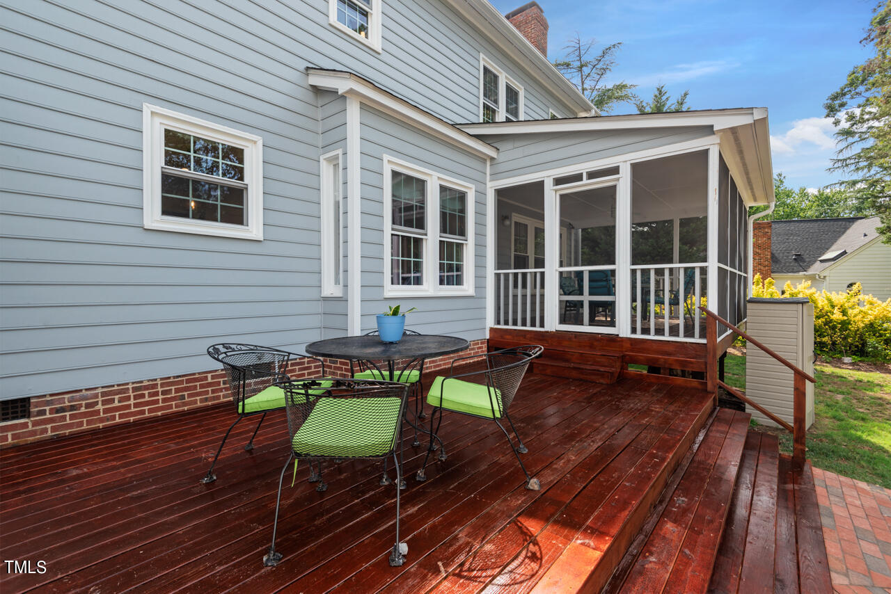5 Caspian Court Durham, NC 27713 - Photo 41 of 48 a view of a deck with wooden floor and outdoor seating