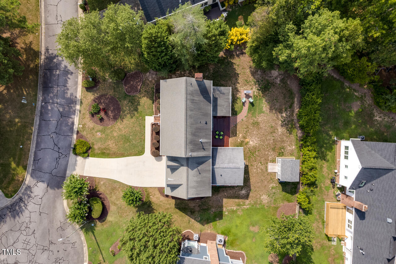 5 Caspian Court Durham, NC 27713 - Photo 43 of 48 an aerial view of a house with a yard swimming pool and outdoor seating