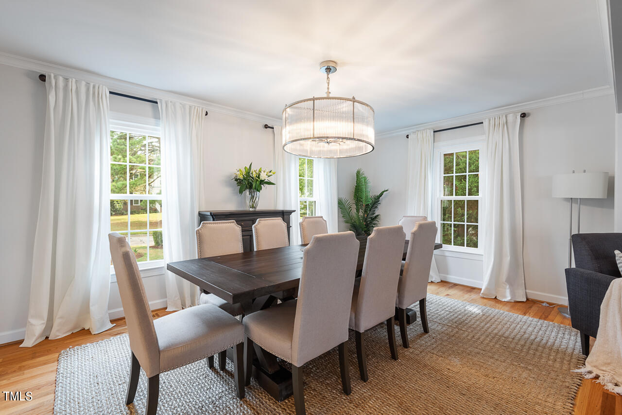 5 Caspian Court Durham, NC 27713 - Photo 6 of 48 a view of a dining room with furniture window and outside view