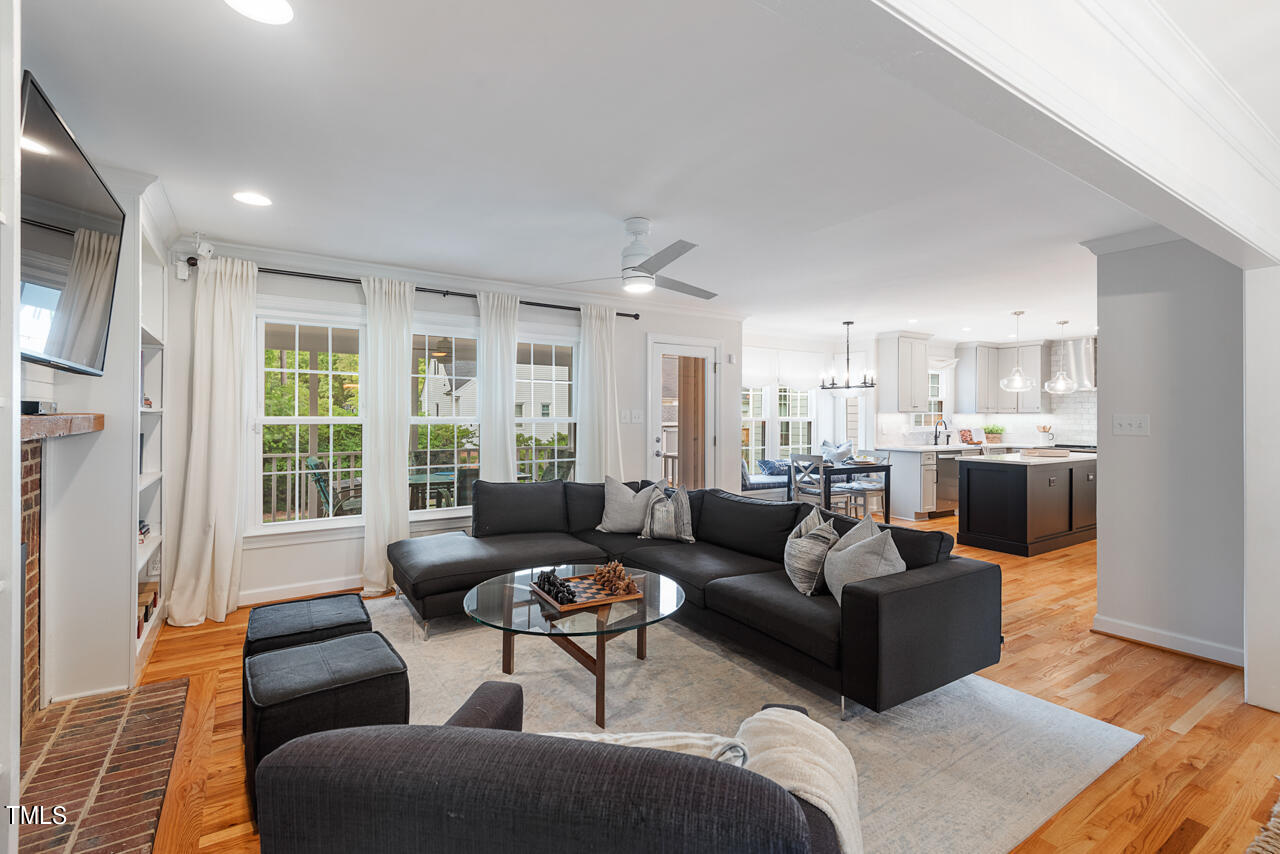 5 Caspian Court Durham, NC 27713 - Photo 7 of 48 a living room with furniture and a large window
