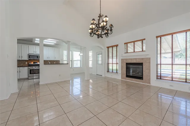 a view of a kitchen with a stove cabinets and a kitchen