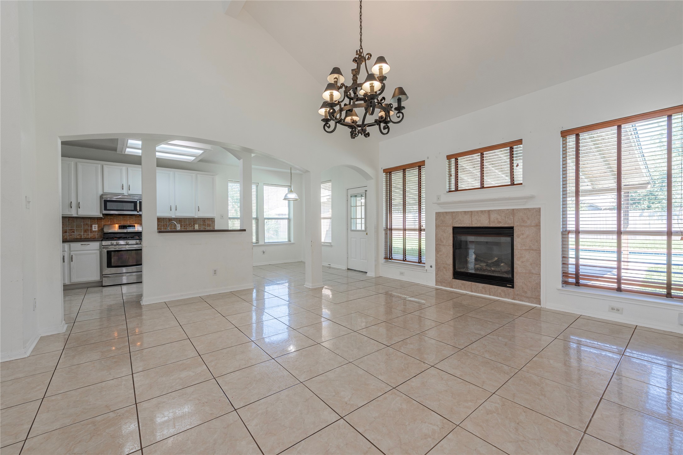 9518 Stone Terrace Court Houston, TX 77089 - Photo 13 of 27 a view of a kitchen with a stove cabinets and a kitchen