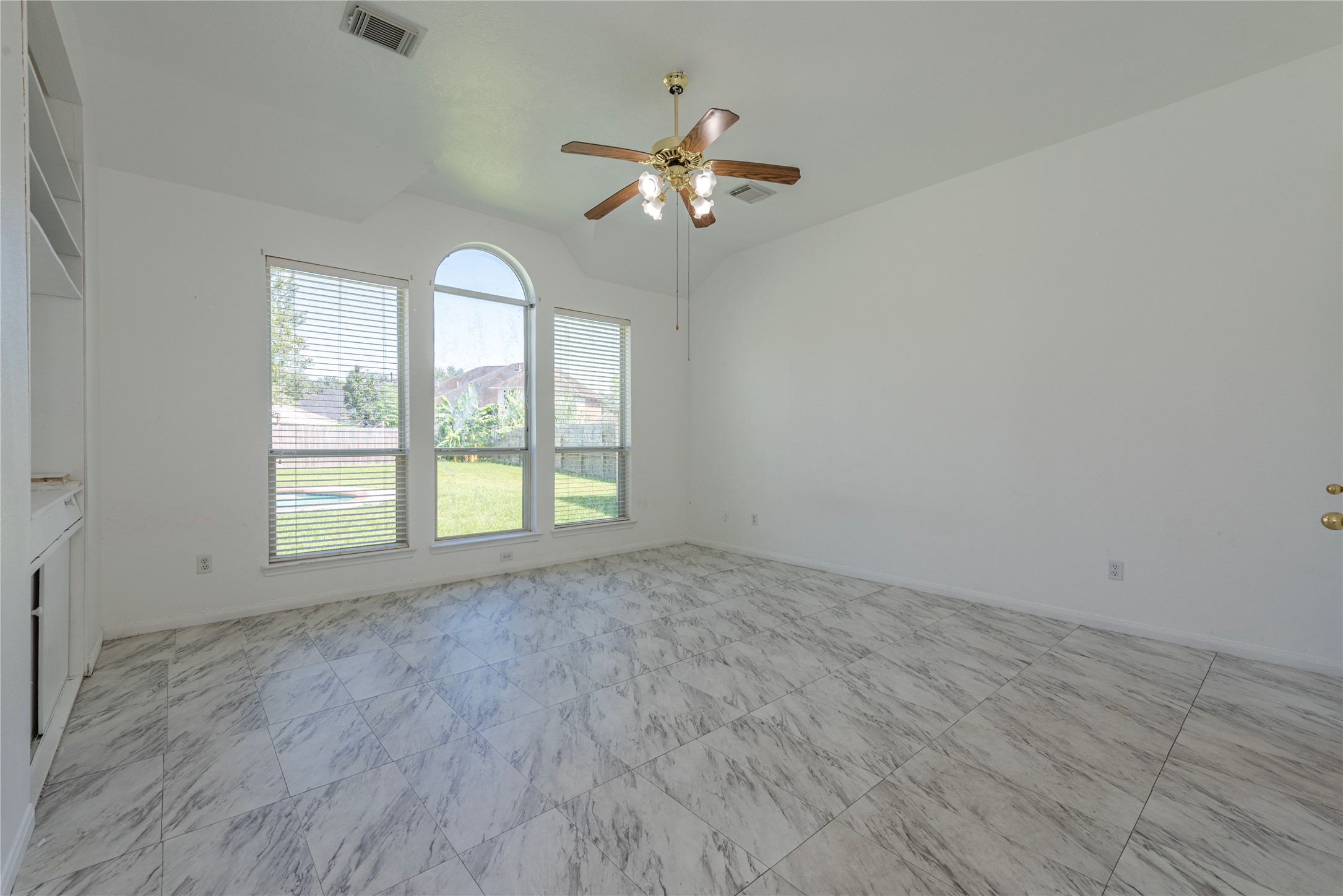 9518 Stone Terrace Court Houston, TX 77089 - Photo 17 of 27 a view of an empty room with a window