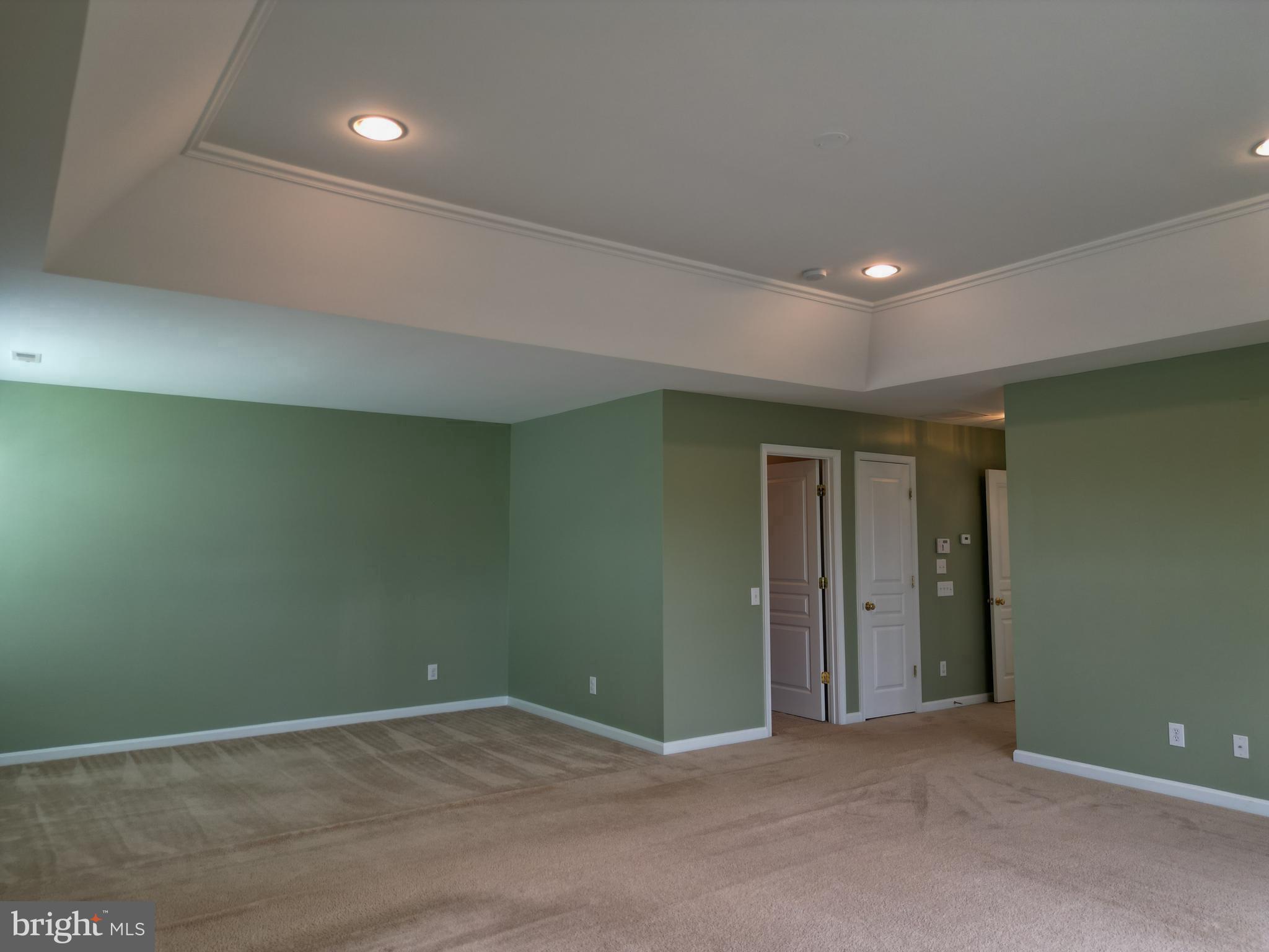 107 Newgate Circle Smyrna, DE 19977 - Photo 22 of 45 an empty room with wooden floor and closet area
