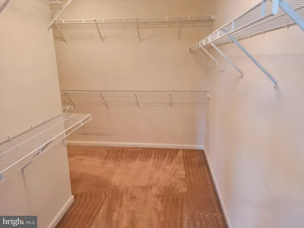 a view of small space with racks on the wall