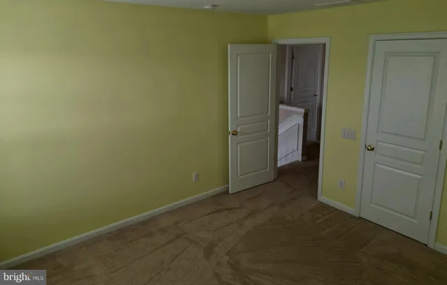 an empty room with closet