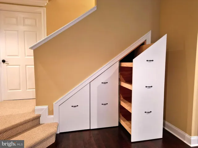 a view of a hallway with staircase