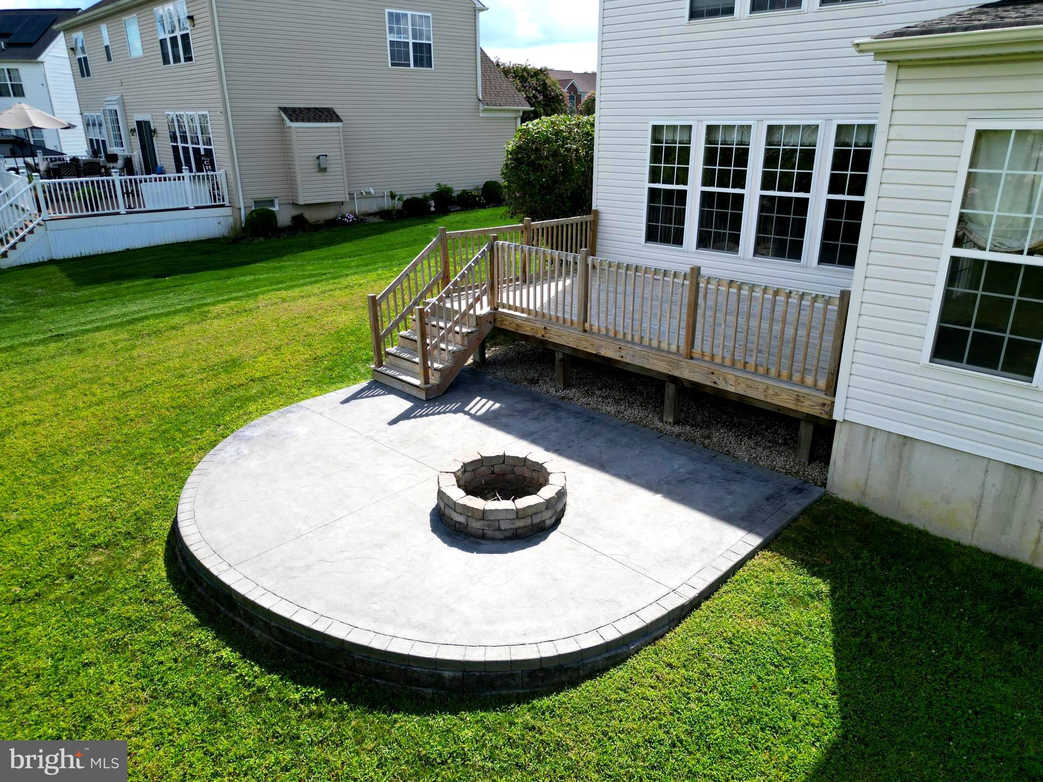 107 Newgate Circle Smyrna, DE 19977 - Photo 42 of 45 a view of a backyard with sitting area and garden