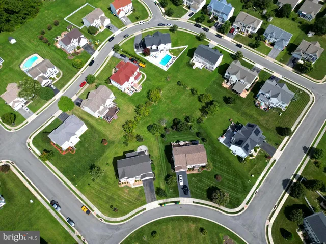 an aerial view of swimming pool residential house with outdoor space