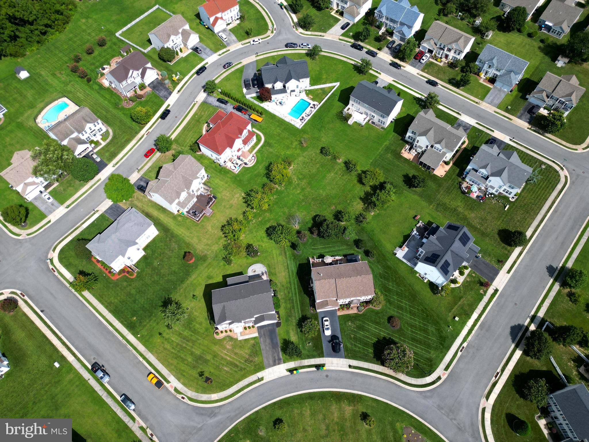 107 Newgate Circle Smyrna, DE 19977 - Photo 5 of 45 an aerial view of swimming pool residential house with outdoor space