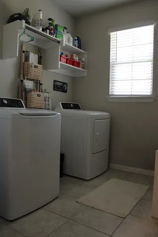 a room with a table and chairs