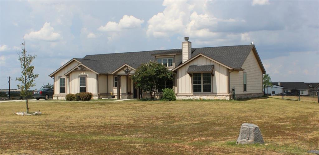 2267 County Road 4010 Decatur, TX 76234 - Photo 4 of 36 a front view of a house with a yard