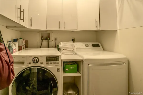a utility room with dryer and washer