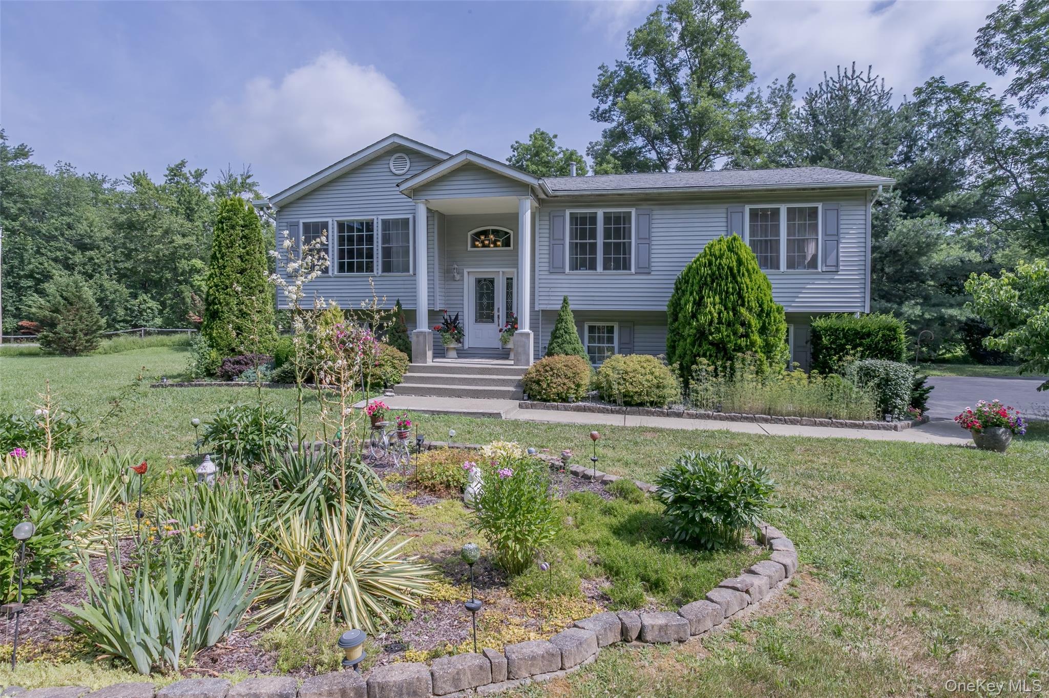 300 Mountain Lodge Road Monroe, NY 10950 - Photo 27 of 41 a front view of a house with a yard