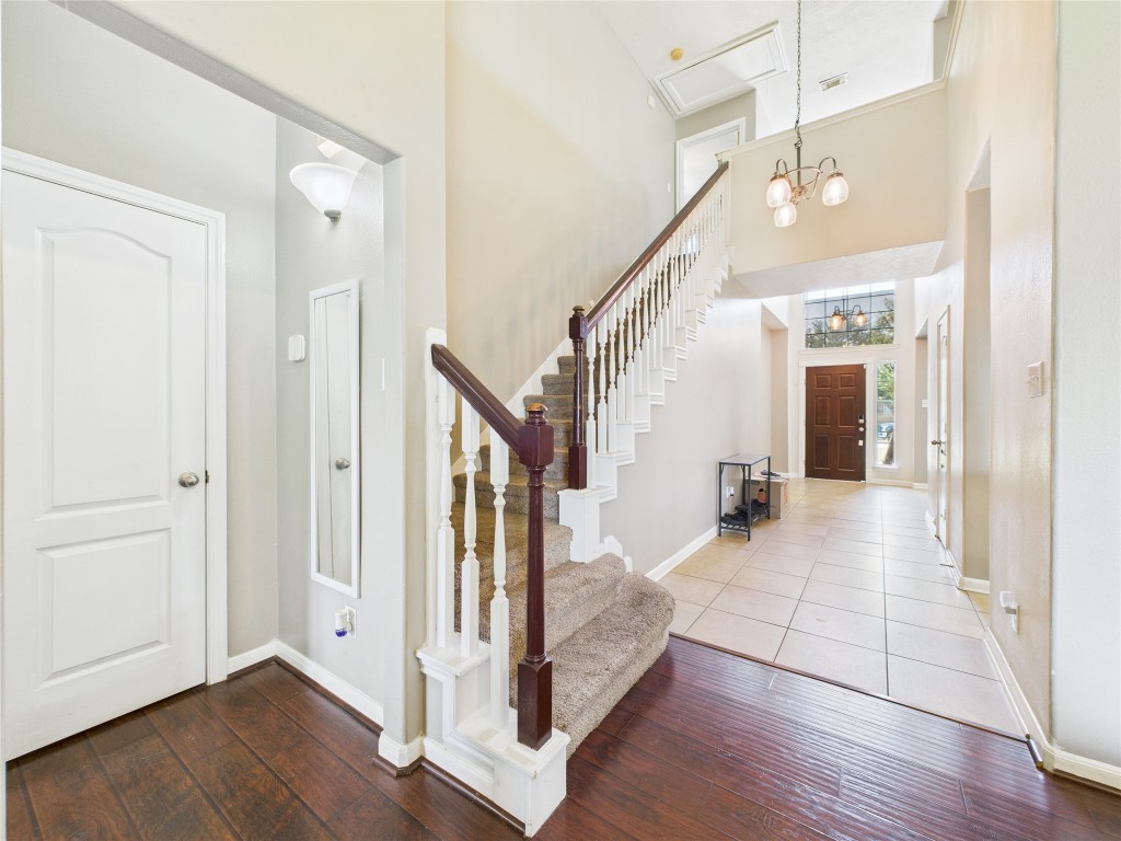 1484 Allison Street Alvin, TX 77511 - Photo 24 of 37 a view of a hallway with entryway wooden floor and stairs