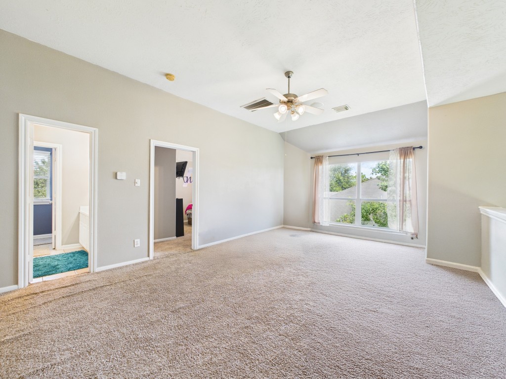 1484 Allison Street Alvin, TX 77511 - Photo 26 of 37 a view of a big room with closet and windows