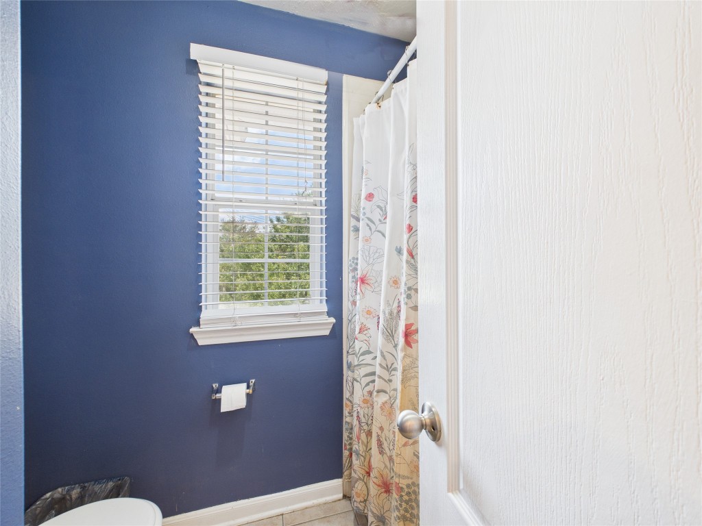 1484 Allison Street Alvin, TX 77511 - Photo 33 of 37 a bathroom with a window