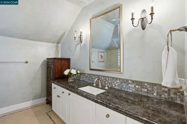 a balcony with furniture and garden