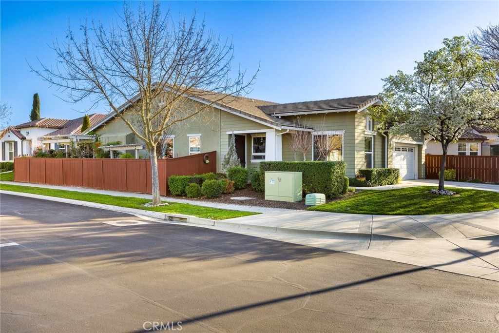2424 Traditions Loop Paso Robles, CA 93446 - Photo 1 of 1 front view of a house and a small yard