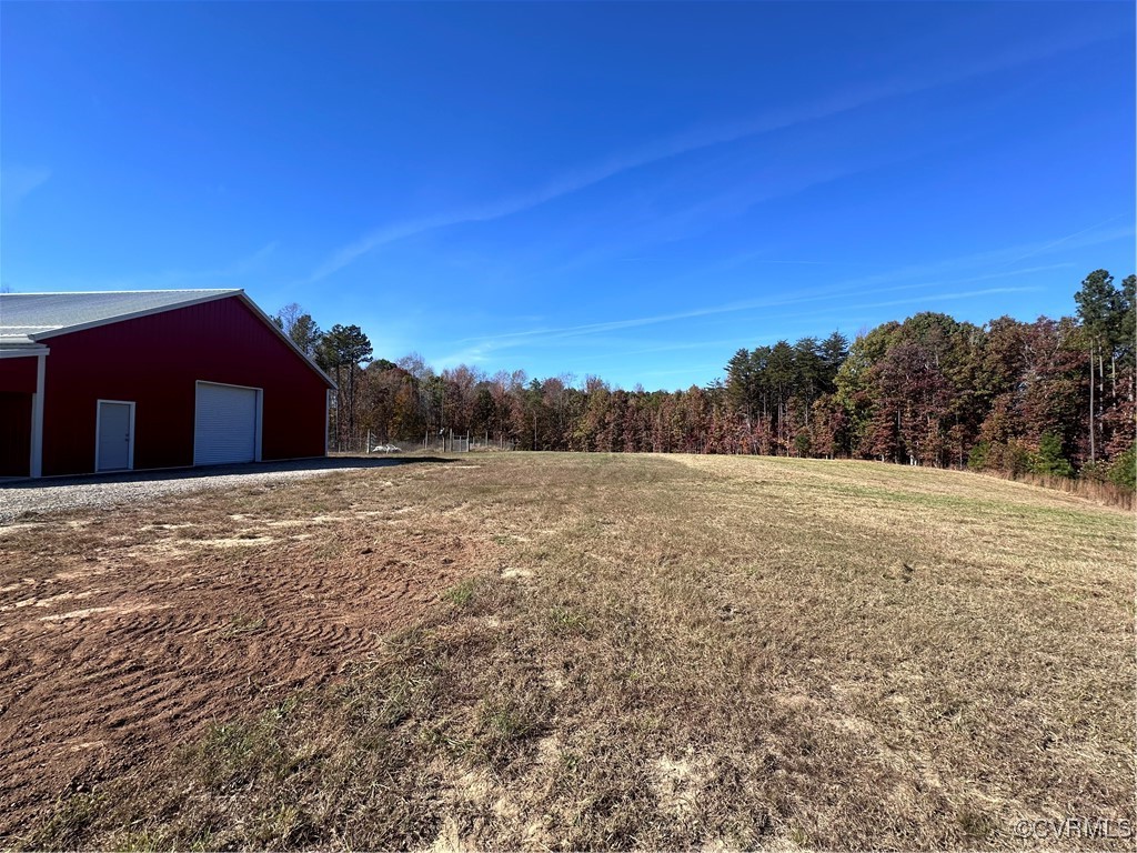 0 Guinea Road Fairfax, VA 22032 - Photo 1 of 1 View of yard featuring an outdoor structure and a