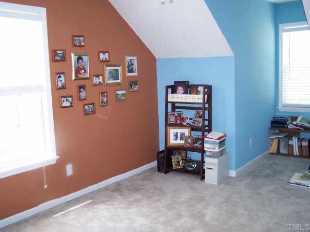 811 Rothshire Court, Unit 811 Raleigh, NC 27615 - Photo 7 of 7 a view of a workspace with furniture and a window