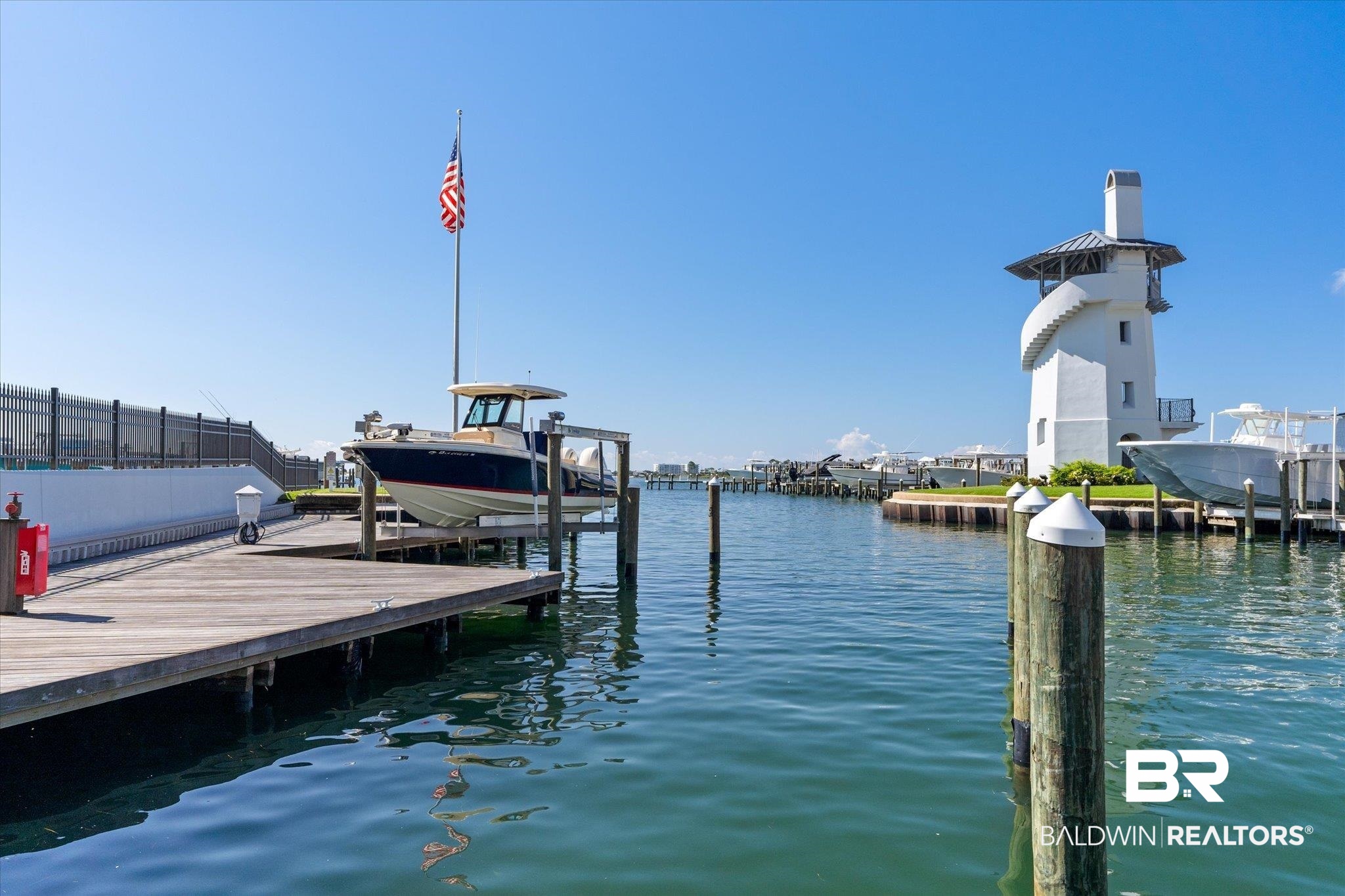 27582 Canal Road, Unit 2611 Orange Beach, AL 36561 - Photo 28 of 37 View of dock featuring a water view