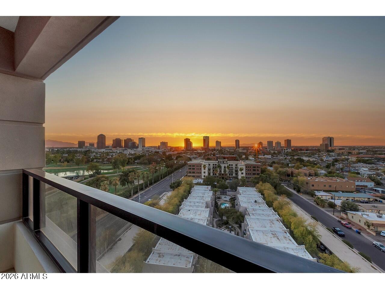 1040 East Osborn Road, Unit 1004 Phoenix, AZ 85014 - Photo 1 of 94 a view of a city from a terrace