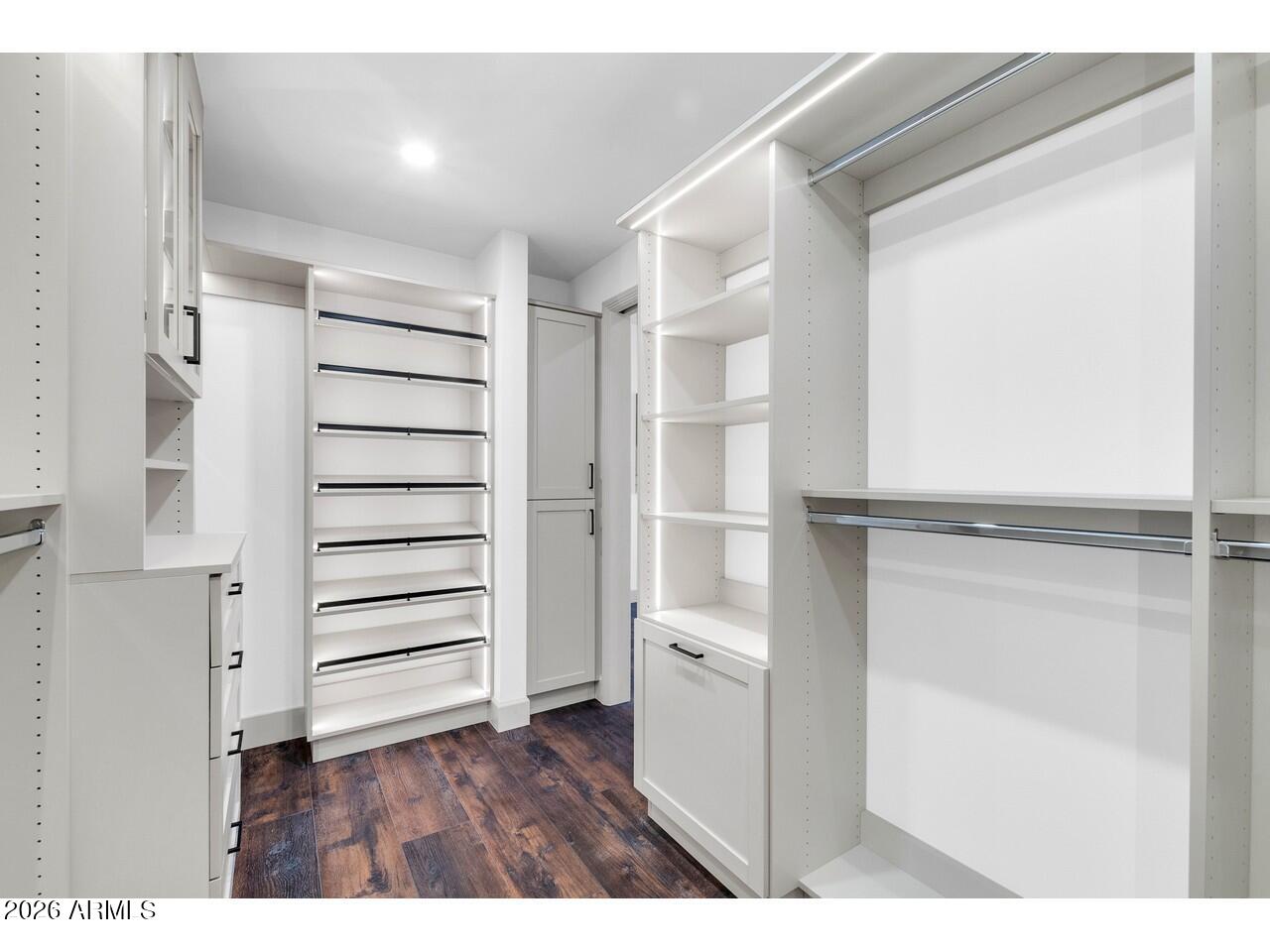 1040 East Osborn Road, Unit 1004 Phoenix, AZ 85014 - Photo 43 of 94 a view of closet area with empty racks
