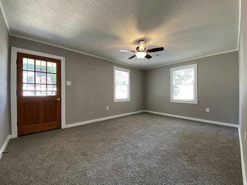 247 Modder Avenue Memphis, TN 38109 - Photo 2 of 9 a view of an empty room with a window