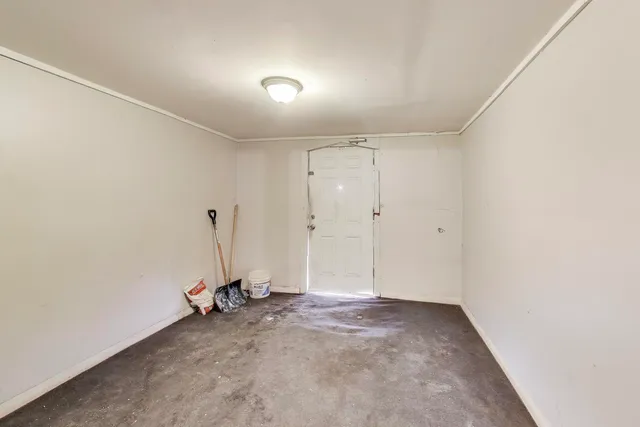 a view of a room with rack on the wall