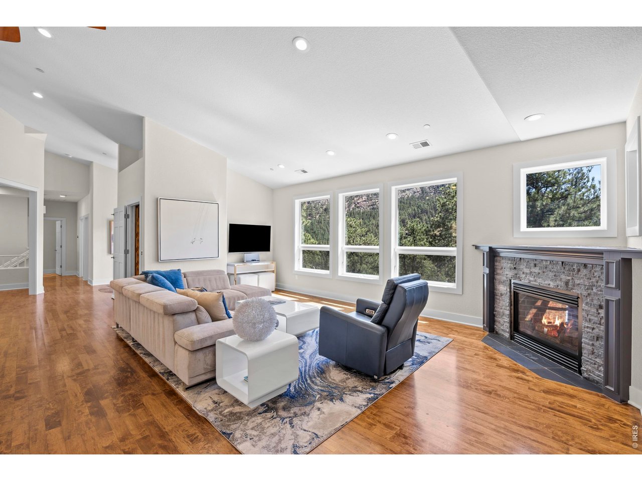 738 Wagonwheel Gap Road Boulder, CO 80302 - Photo 8 of 46 Great room with gas fireplace