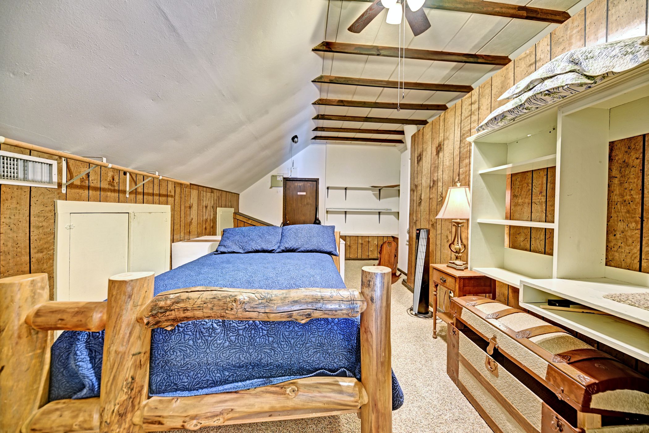 2575 Old Mill Creek Road Brenham, TX 77833 - Photo 25 of 40 a bedroom with furniture and a window