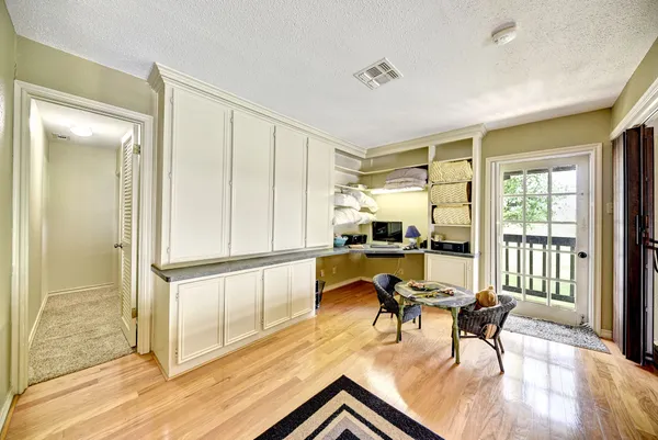 a view of a livingroom with dining room and kitchen view