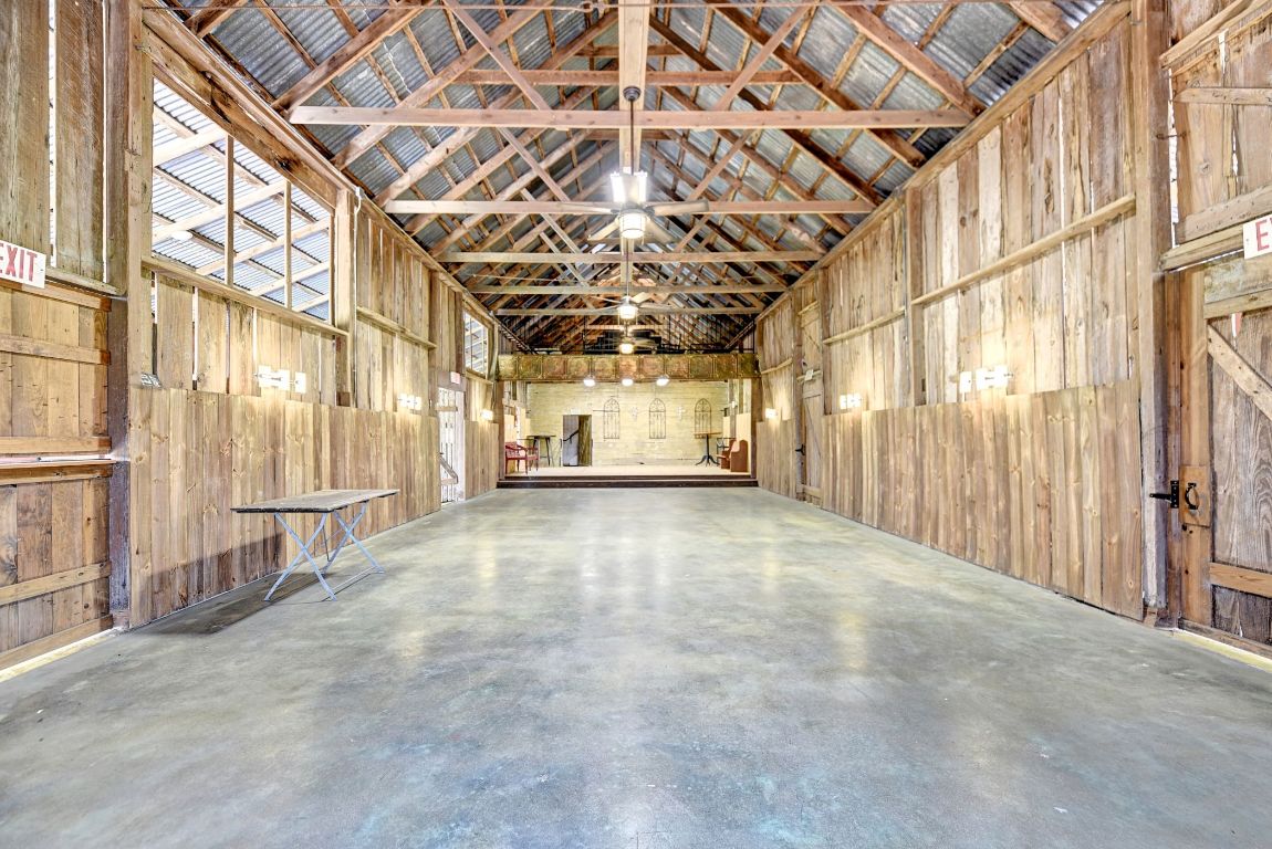 2575 Old Mill Creek Road Brenham, TX 77833 - Photo 35 of 40 a view of a room with a garage