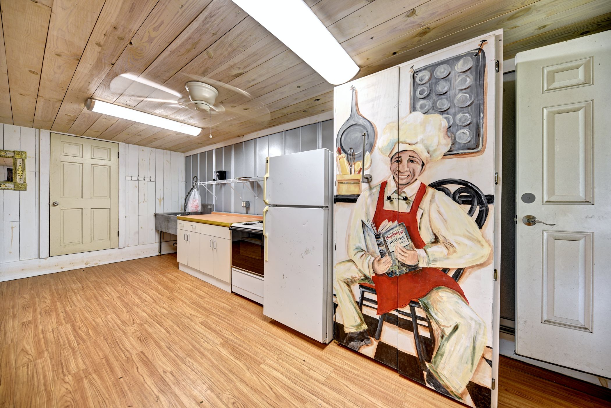 2575 Old Mill Creek Road Brenham, TX 77833 - Photo 37 of 40 a kitchen with stainless steel appliances granite countertop a refrigerator and a stove
