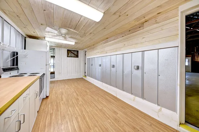 a view of a hallway with a wooden floor