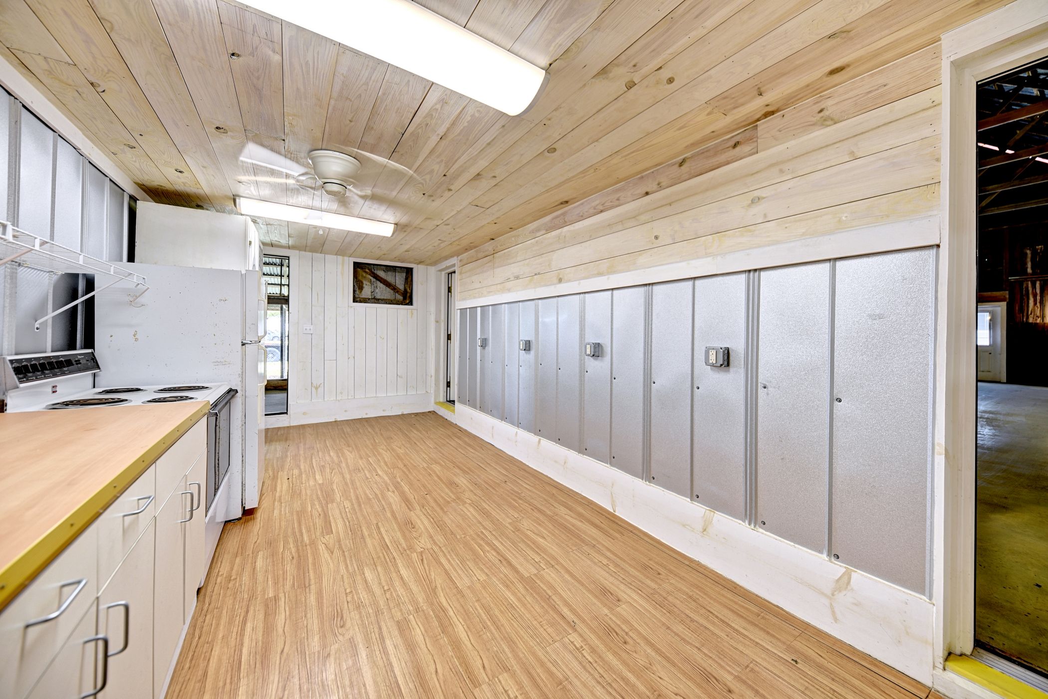 2575 Old Mill Creek Road Brenham, TX 77833 - Photo 38 of 40 a view of a hallway with a wooden floor