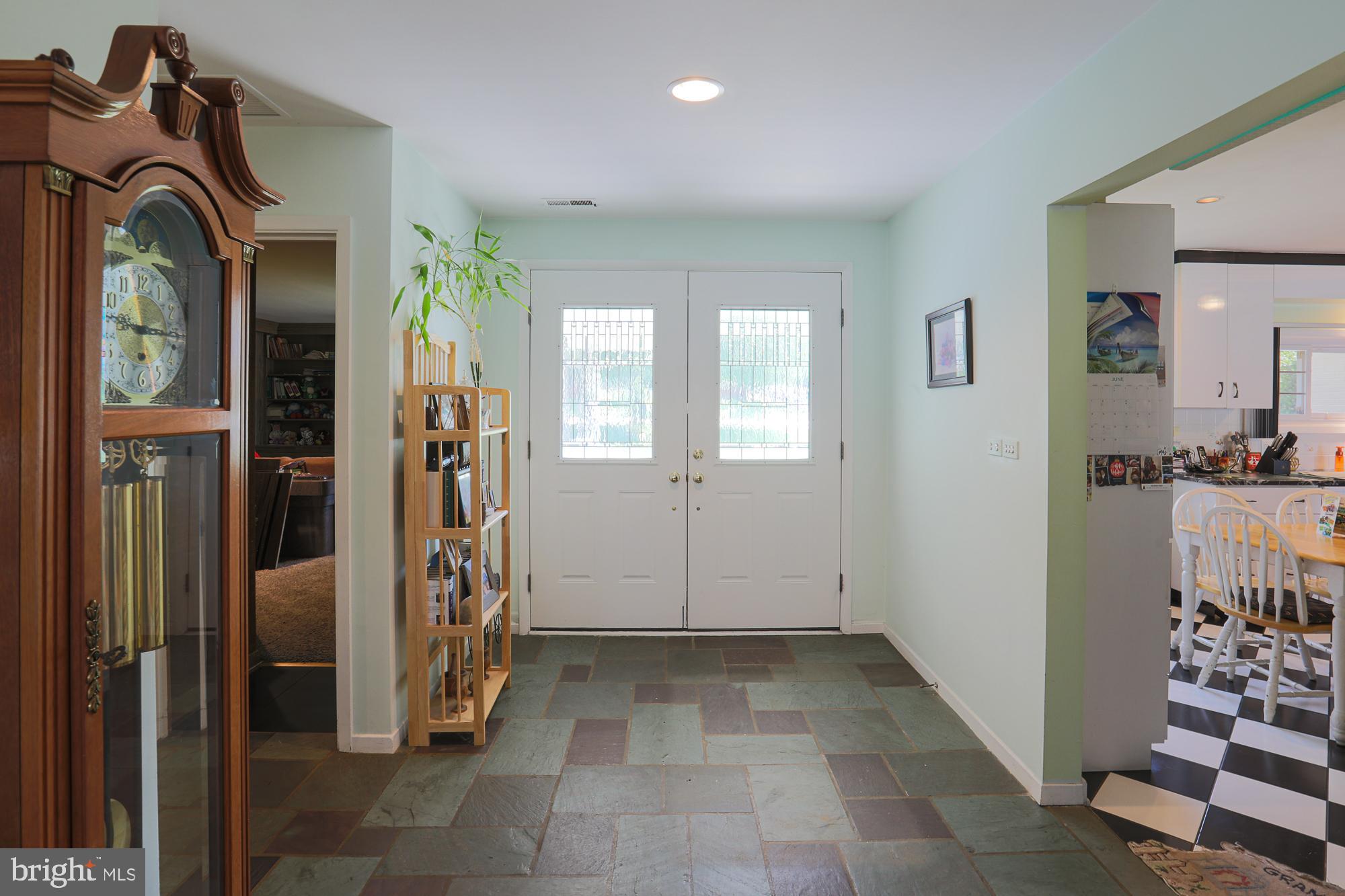 7940 Stevenson Road Pikesville, MD 21208 - Photo 3 of 55 Double doors into the foyer