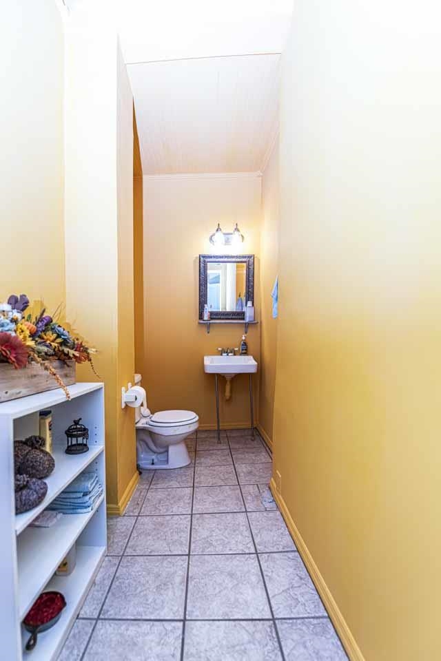 726 South Main Street Covington, TN 38019 - Photo 11 of 40 Ceramic tile flooring in a neutral tone