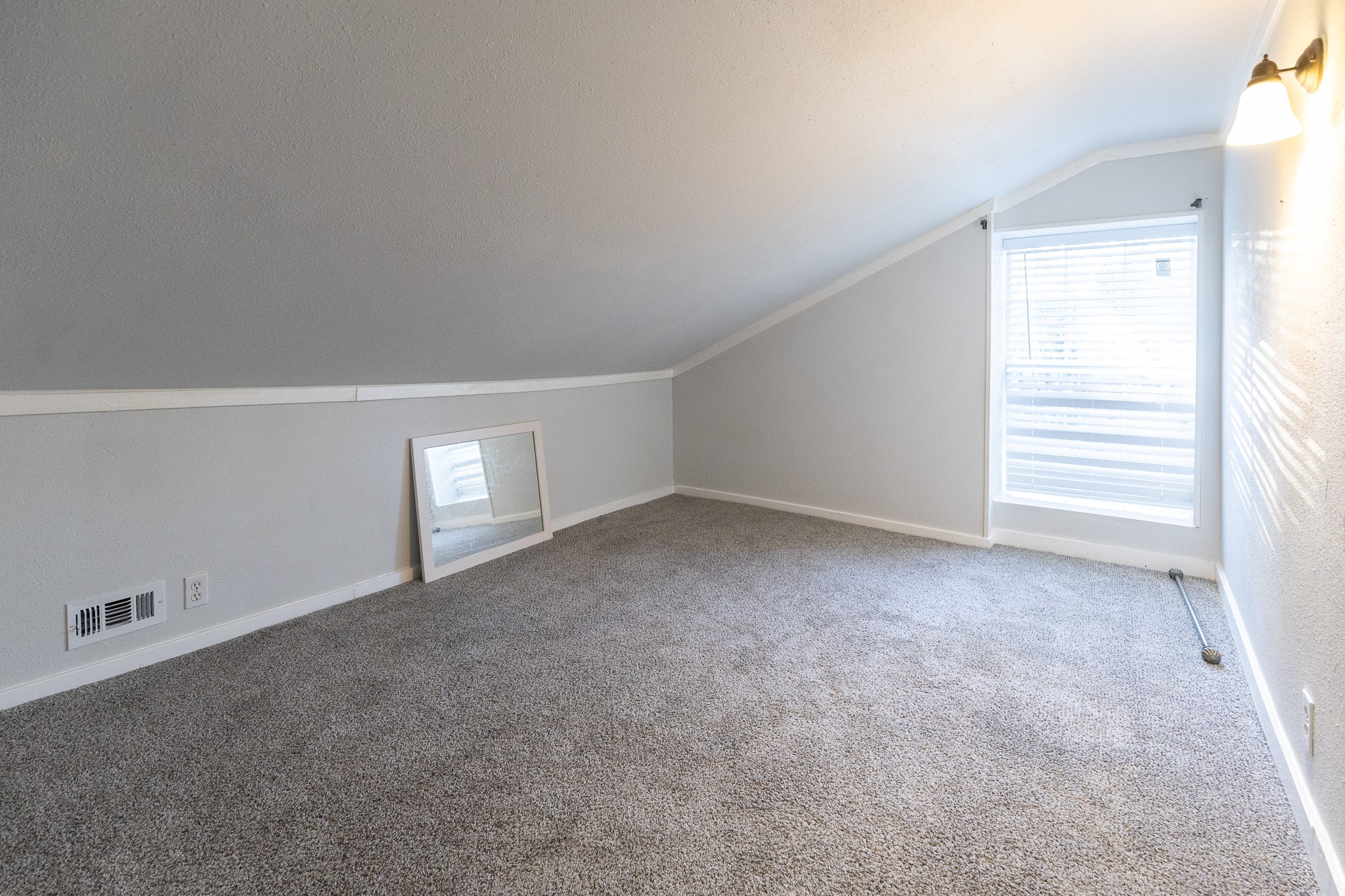 1425 15th Street Huntsville, TX 77340 - Photo 33 of 50 a view of an empty room with a window