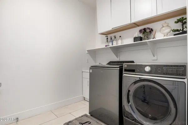 a view of house with backyard