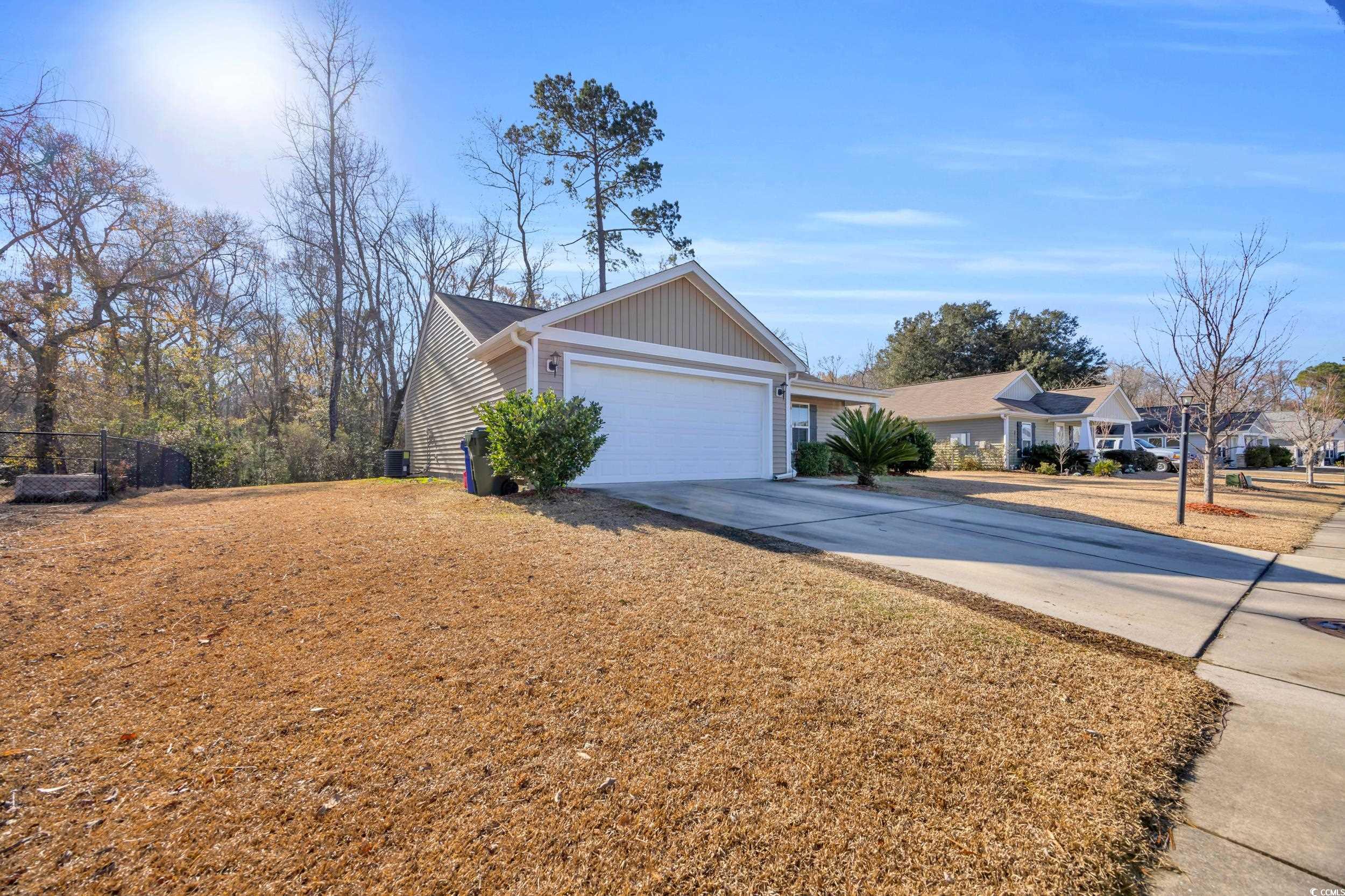 1240 Pine Ridge Street Conway, SC 29527 - Photo 9 of 34 View of front of property featuring a garage and a