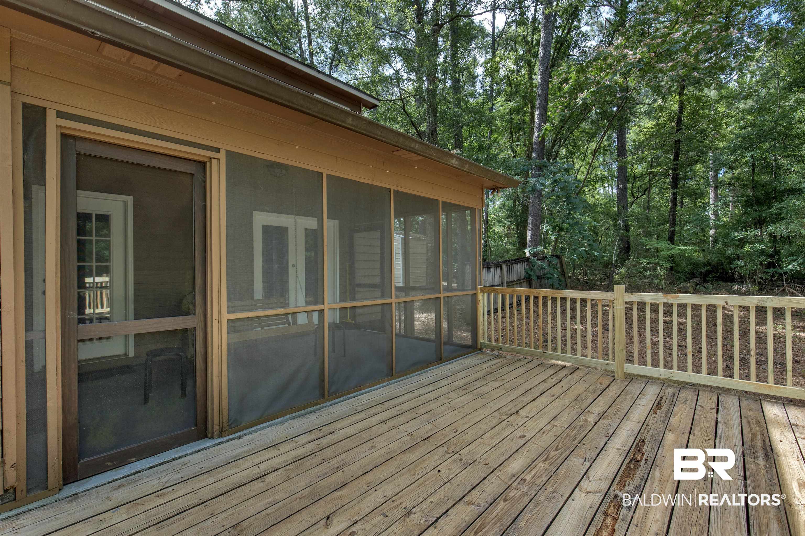 31375 Stagecoach Road Daphne, AL 36527 - Photo 20 of 21 Wooden terrace featuring a sunroom
