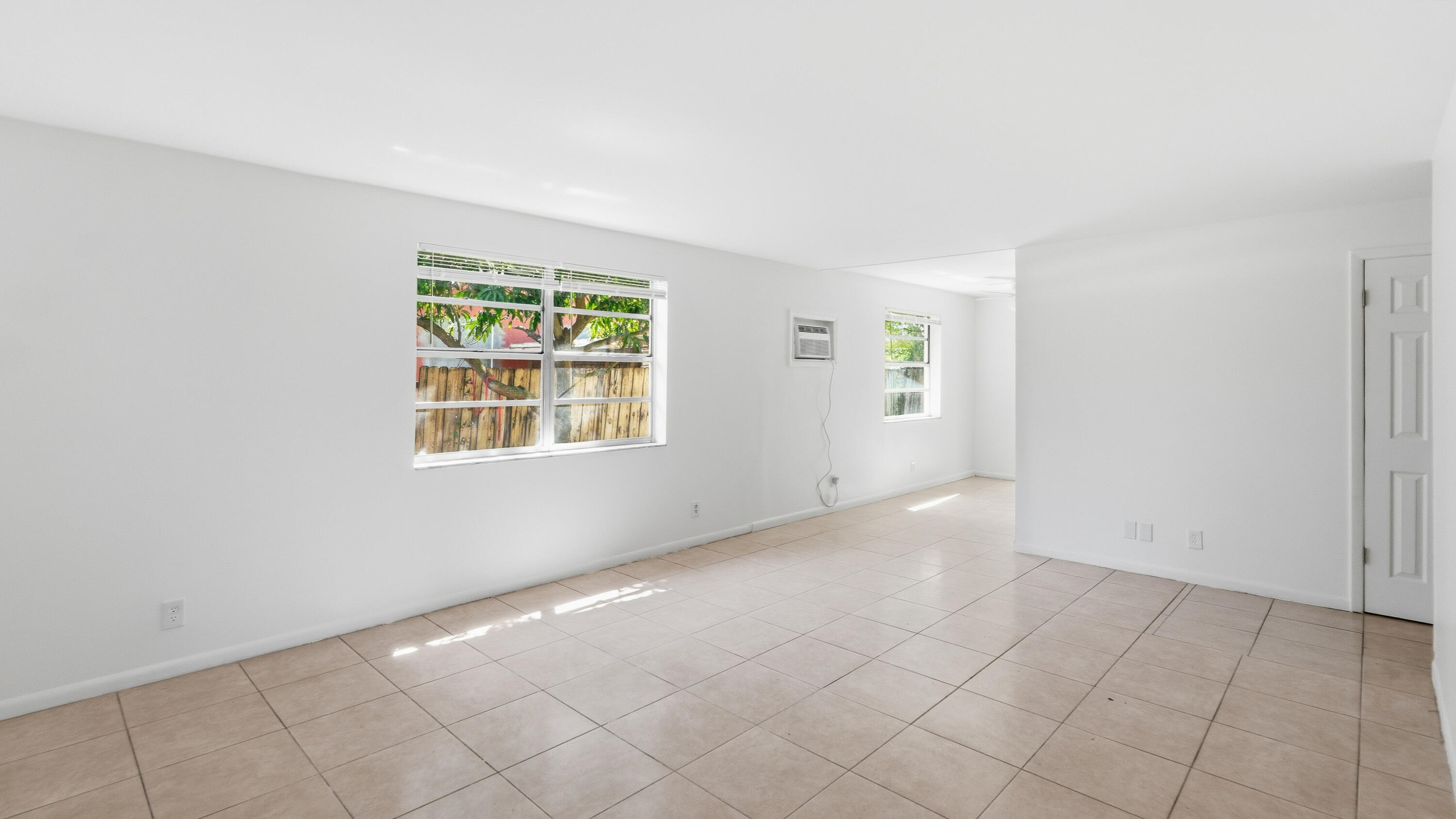 4453 Stevens Road Lake Worth Beach, FL 33461 - Photo 41 of 67 an empty room with windows