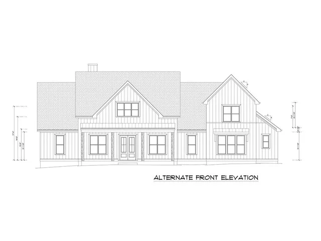 a kitchen with white cabinets and sink