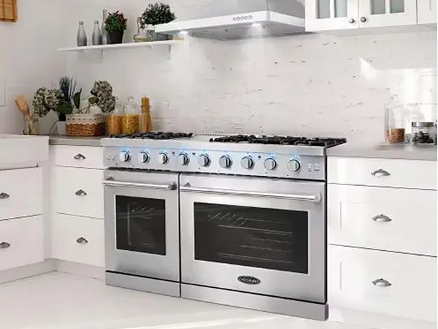 a bathroom with a sink double vanity granite tub shower and a mirror
