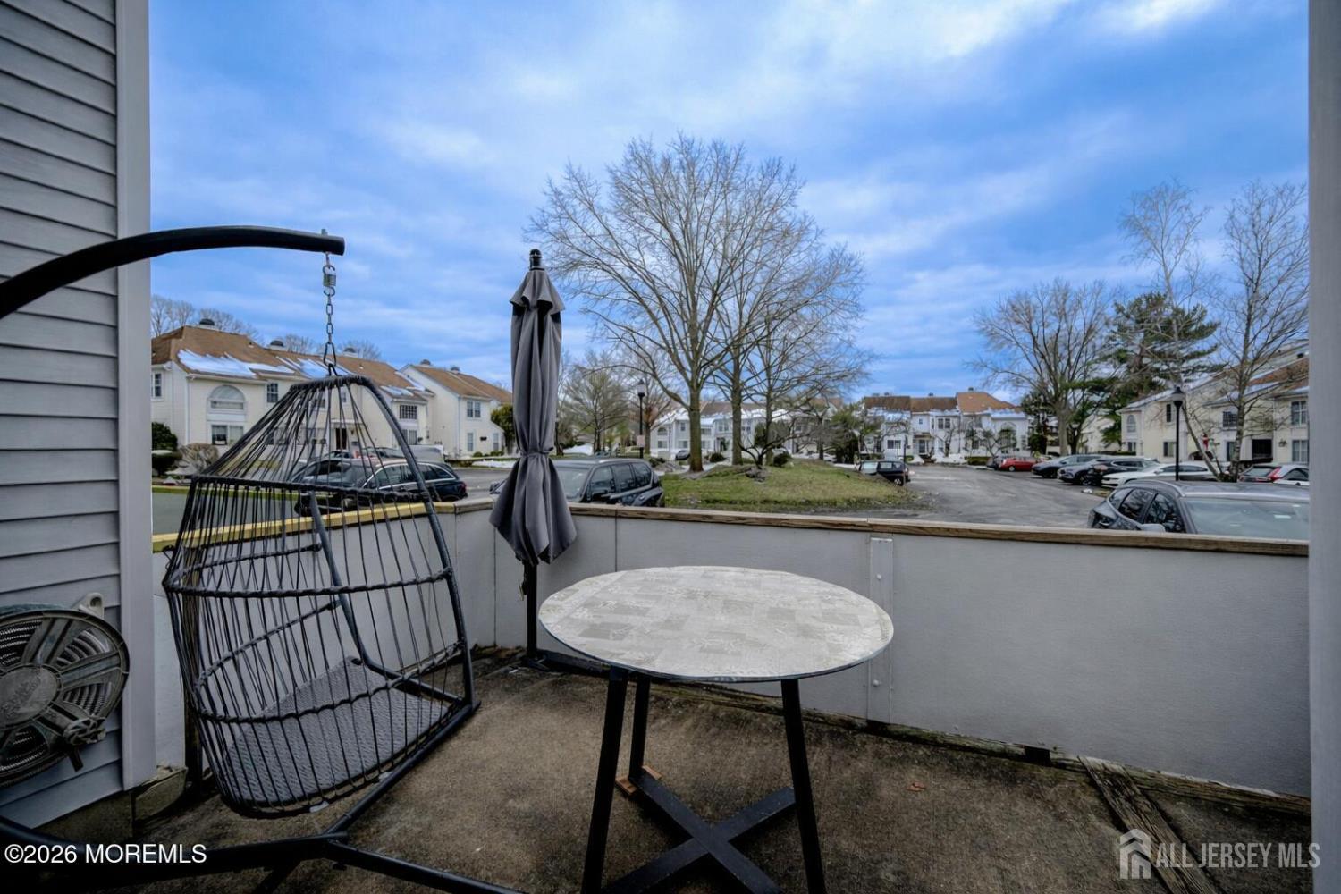22 Borell Square Parlin, NJ 08859 - Photo 29 of 32 a view of balcony with wooden floor and outdoor seating