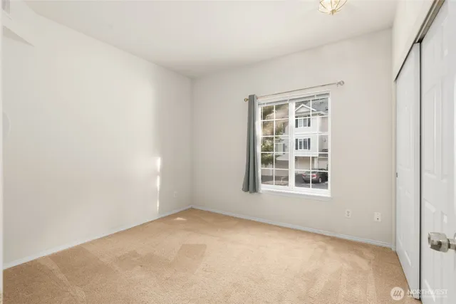 a bathroom with a sink vanity mirror and a bathtub