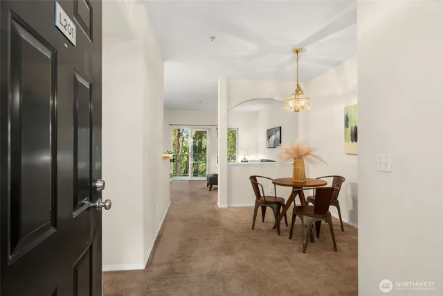 a view of a dining room with furniture