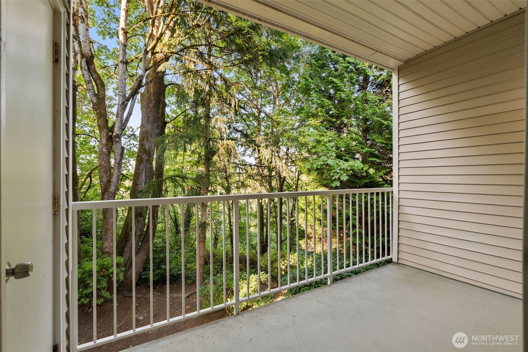 12120 Northeast 172nd Place, Unit L201 Bothell, WA 98011 - Photo 21 of 35 a view of a balcony
